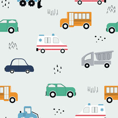 Baby seamless pattern with transport. Cartoon toy cars. Hand drawn cars in Scandinavian style. Funny vehicles. Creative kids background. Ambulance, school bus, truck, bulldozer. © Katerina