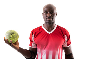 Portrait of confident young african american male athlete holding ball while playing handball