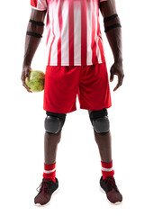 Low section of african american handball player wearing protective guards holding ball