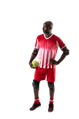 Young african american male handball player holding ball looking away against white background