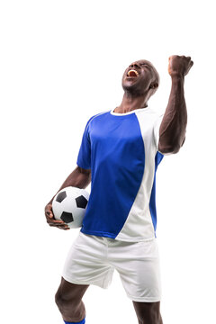 Young african american soccer player holding ball celebrating goal over white background