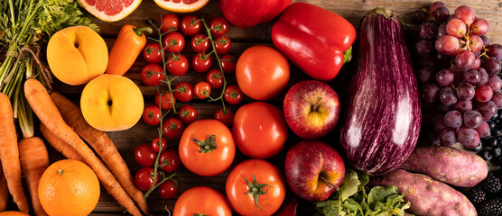 Panoramic shot of various fruits and vegetables on table