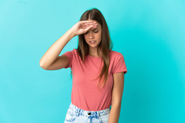 Young woman over isolated blue background with tired and sick expression