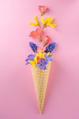 spring flowers in waffle cone, bouquet, flat lay