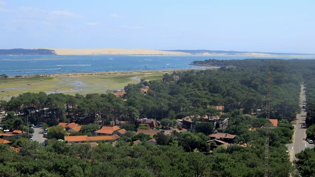 Aerial view of the Cap Ferret peninsula and the Mimbeau conche with the Dune of Pilat in the background in Gironde, France