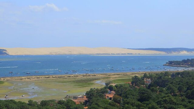 Aerial view of the Cap Ferret peninsula and the Mimbeau conche with the Dune of Pilat in the background in Gironde, France