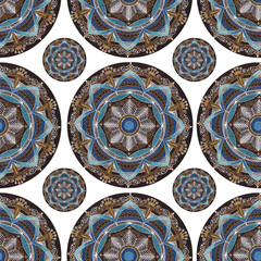 Decorative tile mosaic with blue and gold colors. Seamless pattern with mandala on white background.