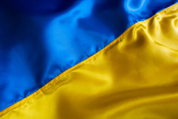 Silk waving Ukrainian national flag background