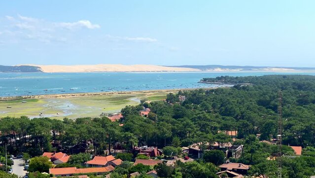 Aerial view of the Cap Ferret peninsula and the Mimbeau conche with the Dune of Pilat in the background in Gironde, France