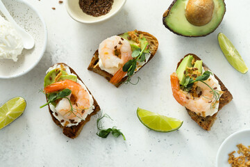 Roasted shrimps with cream cheese on toast