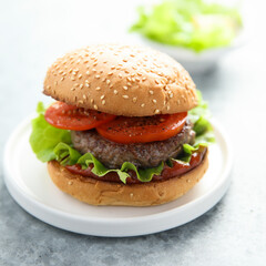 Traditional homemade burger with fresh tomato