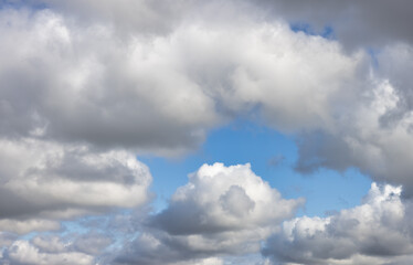 View of Cloudscape during a cloudy blue sky sunny day.