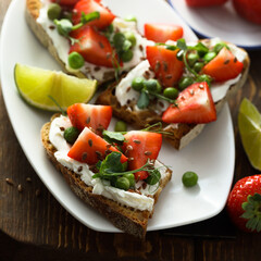 Homemade strawberry bruschetta with green pea