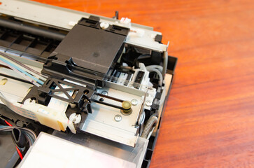 Fototapeta na wymiar Components inside an inkjet printer Soft focus