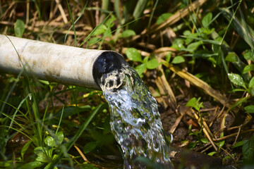 Water is flowing through the pipe.