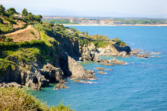 South of France. View from Collioure cliffs to Argeles-sur-Mer beach. Camping on hill. Cote Vermeille. Pyrenees-Orientales, near the border with Spain.