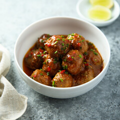 Homemade meatballs with tomato sauce and chili