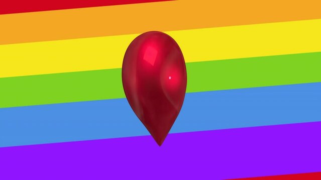 Animation of heart over rainbow background