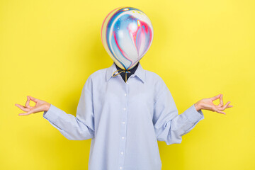 Picture of mindful peaceful woman meditatekeeps hands om gesture air balloon instead of head try to...