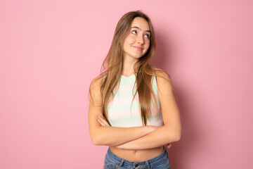 Photo of attractive charming lady smiling hold arms hands crossed good mood self-confident person isolated pink color background