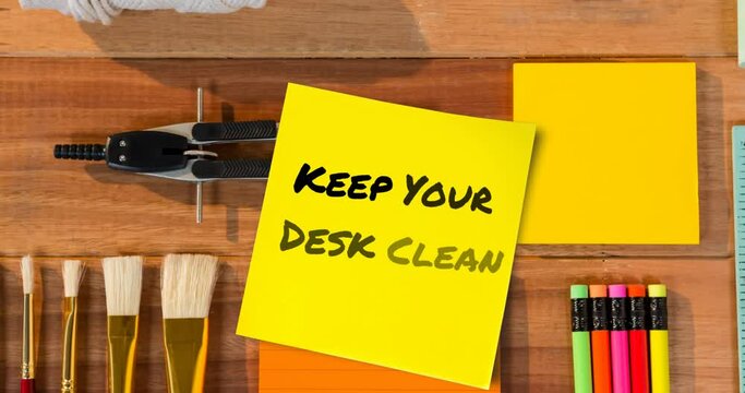 Animation of keep your desk clean text over desk with stationery