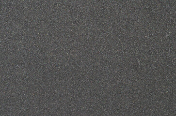 black sponge foam material surface background with soft pores
