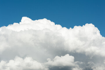 Naklejka na ściany i meble Blue sky with white volume cumulus clouds