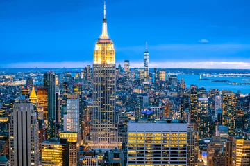 Fototapete Empire State Building Epic skyline of New York City evening view