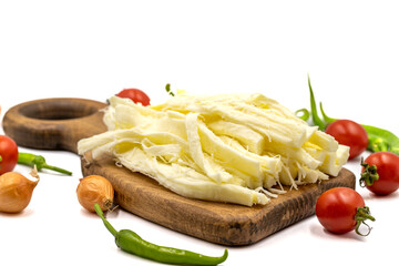 Cecil cheese or String cheese isolated on a white background. Delicious assortment of cheeses. close up