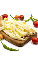 Cecil cheese or String cheese isolated on a white background. Delicious assortment of cheeses. close up