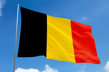 3d illustration. A beautiful view of Belgium flag on a blue sky background.