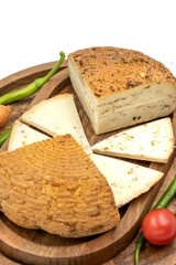 Smoked cheese on a white background. Delicious assortment of cheeses. close up