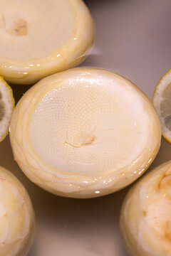 Raw artichokes. Fresh peeled artichokes on the market counter. close up