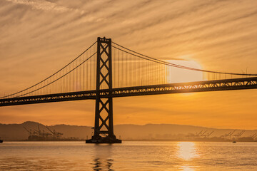 Fototapeta na wymiar San Francisco Bridge Backlit in the Morning During Golden Hour