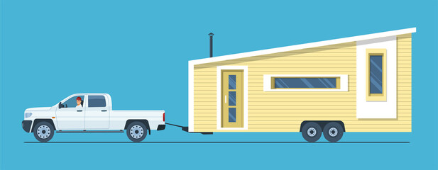 A pickup truck with a man at the wheel is towing a tiny house. Vector illustration. - obrazy, fototapety, plakaty