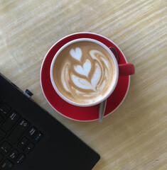 a cup of arabica coffee combined with fresh milk which is one of the coffee menus at a cafe in Malang, East Java, Indonesia