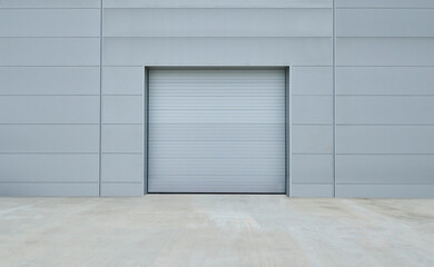 Factory door, grey, outside, asphalt.