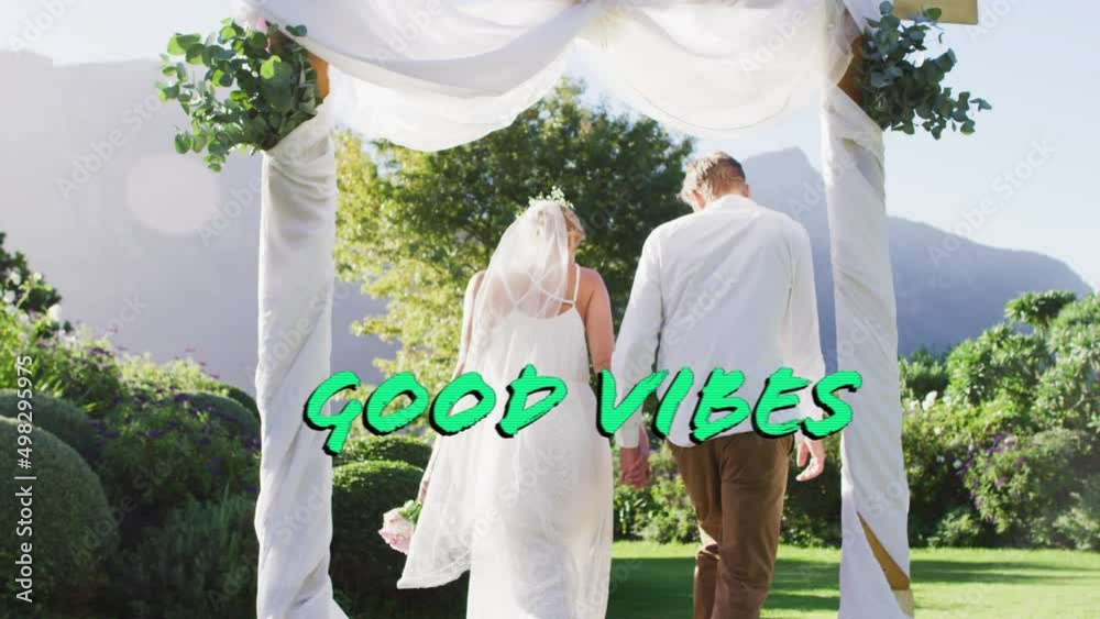 Poster Animation of good vibes text over caucasian married couple holding hands