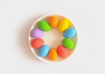 Fototapeta na wymiar Colorful easter eggs on white background. Food decoration on holiday.