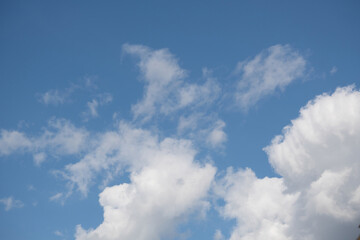 white clouds in the blue sky
