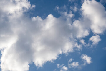 white clouds in the blue sky