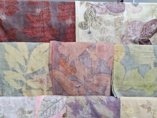 batik cloth in a cloth shop. ecoprint batik with leaf and flower motifs and abstract motifs. Indonesian batik motifs