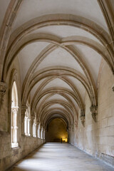 Fototapeta na wymiar hallway and cloister with elaborate stonemasonry in the Alcobaca Monastery