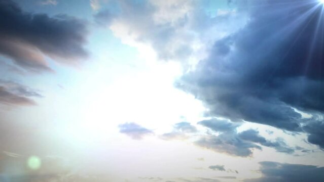 Animation of clouds over sun and blue sky