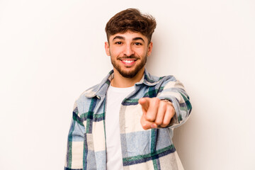 Young hispanic man isolated on white background cheerful smiles pointing to front.