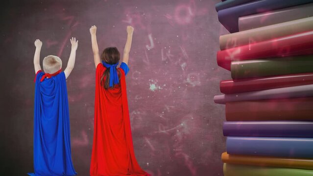 Animation of letters moving over boy and girl in superhero capes with stack of books