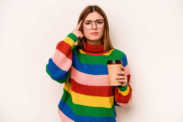 Young caucasian woman holding a take away coffee isolated on white background showing a...