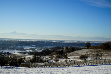 The hills of the Langhe in winter with snow