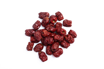 Dried Chinese jujube piled on a white background. Isolated image.