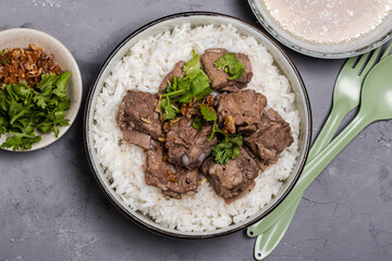 Dried Rice Porridge with Boiled Pork Bones and Broth
